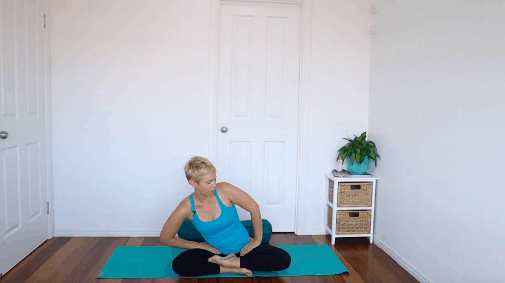 Fertility yoga pose:  Seated hip circles to increase mobility and circulation in the pelvis / reproductive organs for fertility