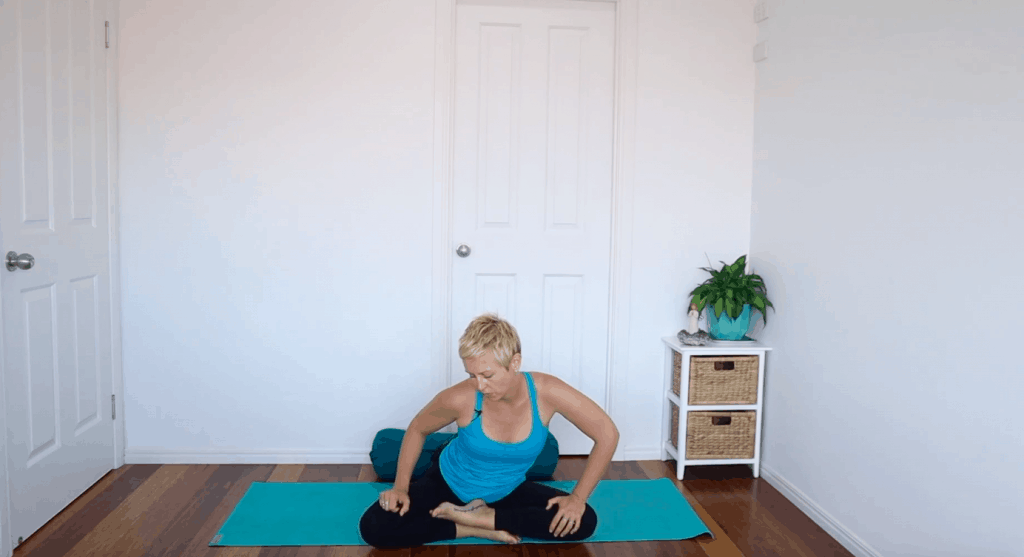 Fertility yoga pose: Seated hip circles to increase mobility and circulation in the pelvis / reproductive organs for fertility