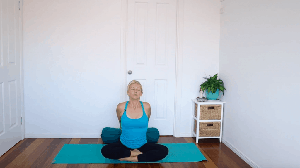 Fertility yoga pose:  Seated Chest Stretch to help reduce anxiety and improve energy in the body for fertility