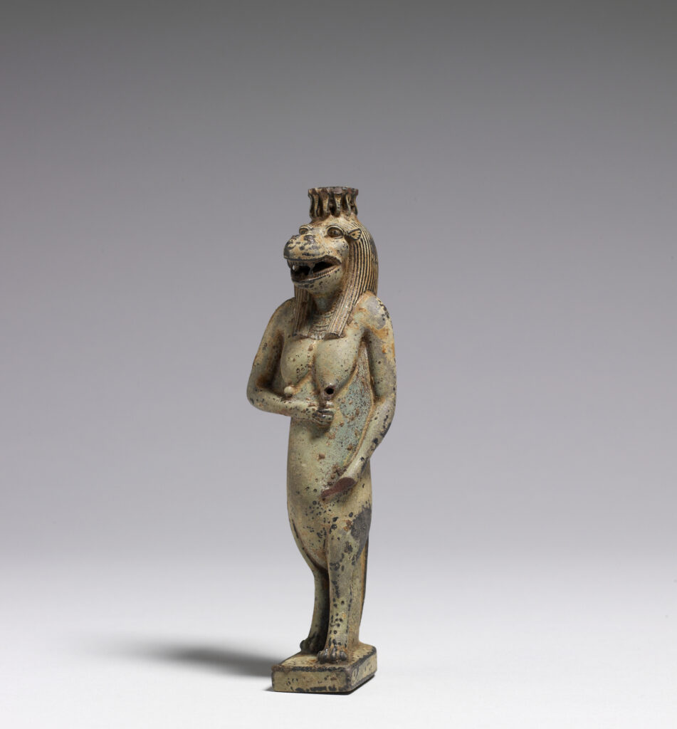 Tawaret, Ancient Egyptian Goddess of Water and Fertility, depicted as an upright, pregnant hippopotamus with crocodile back and tail, lion paws, and human arms.