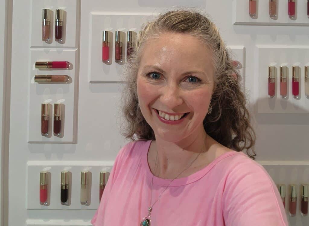 Anna Rapp with a wall of lipgloss, Joining Beautycounter Tips
