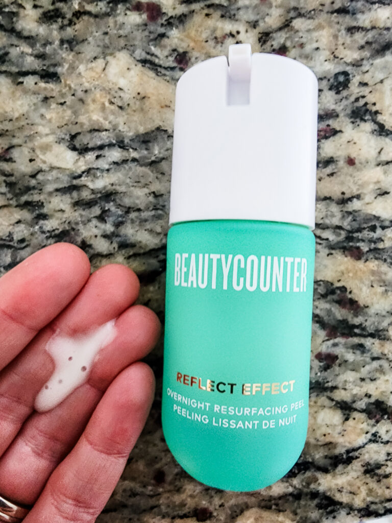 close up of overnight resurfacing peel on hand next to jar of Beautycounter overnight resurfacing peel; how to use the reflect effect overnight resurfacing peel